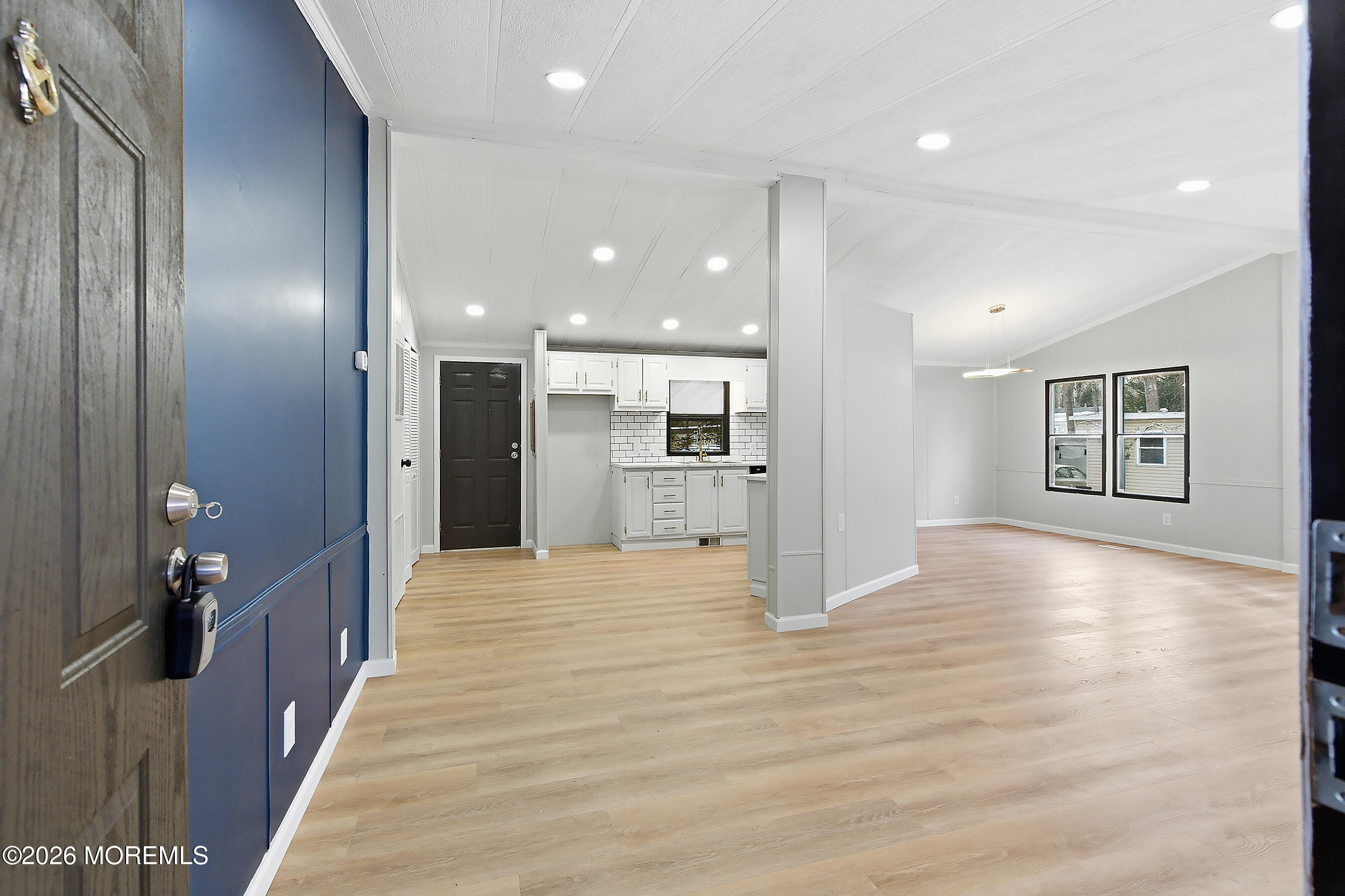 6 Loblolly Lane Jackson, NJ 08527 - Photo 4 of 20 a view of a kitchen with a refrigerator and a window
