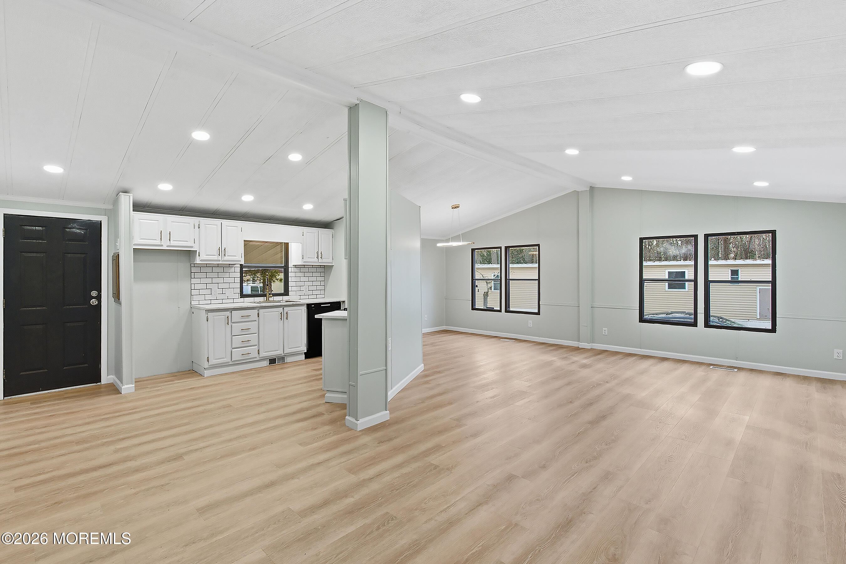 6 Loblolly Lane Jackson, NJ 08527 - Photo 6 of 20 a view of kitchen with kitchen island wooden floor and center island