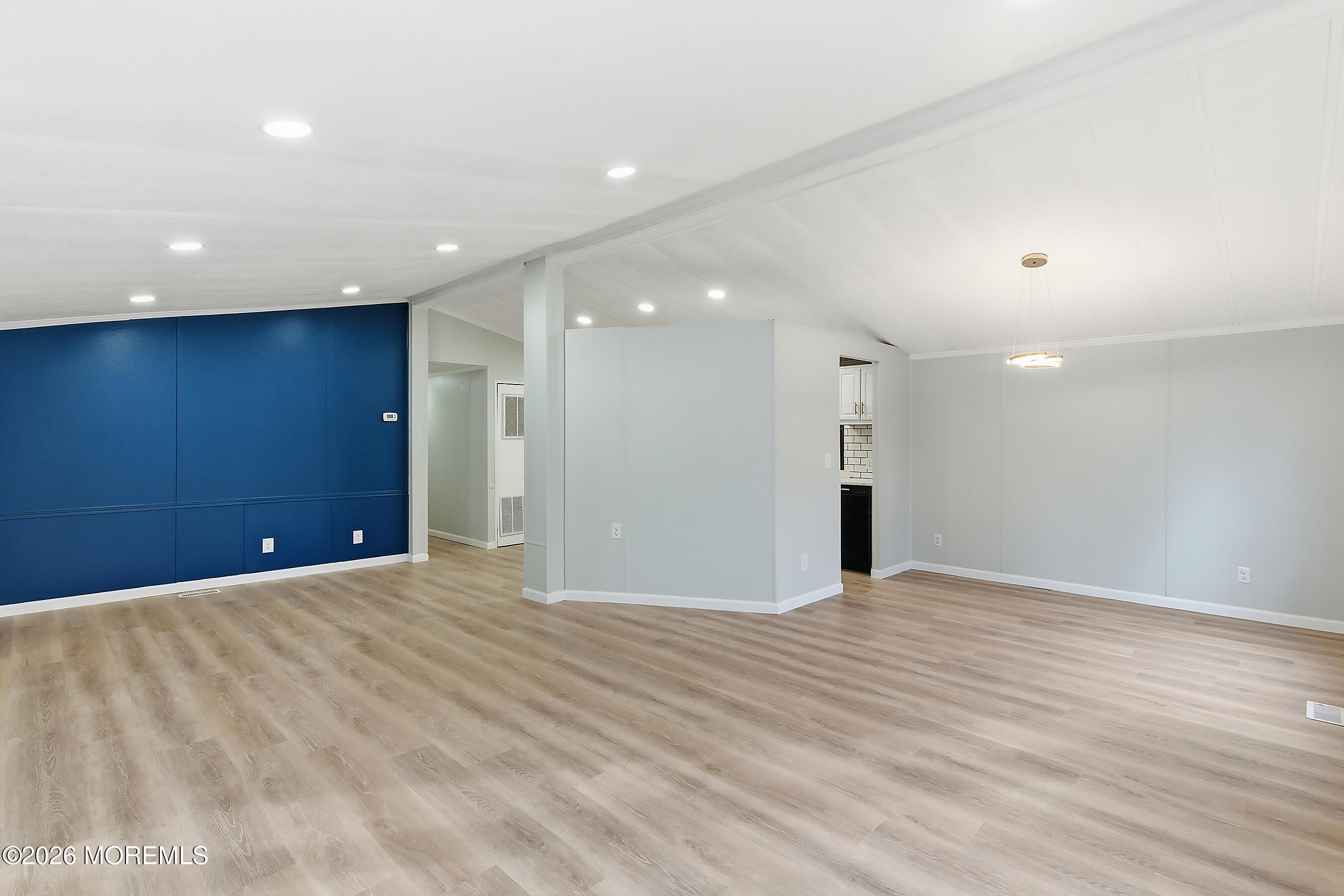6 Loblolly Lane Jackson, NJ 08527 - Photo 8 of 20 a view of an empty room with wooden floor