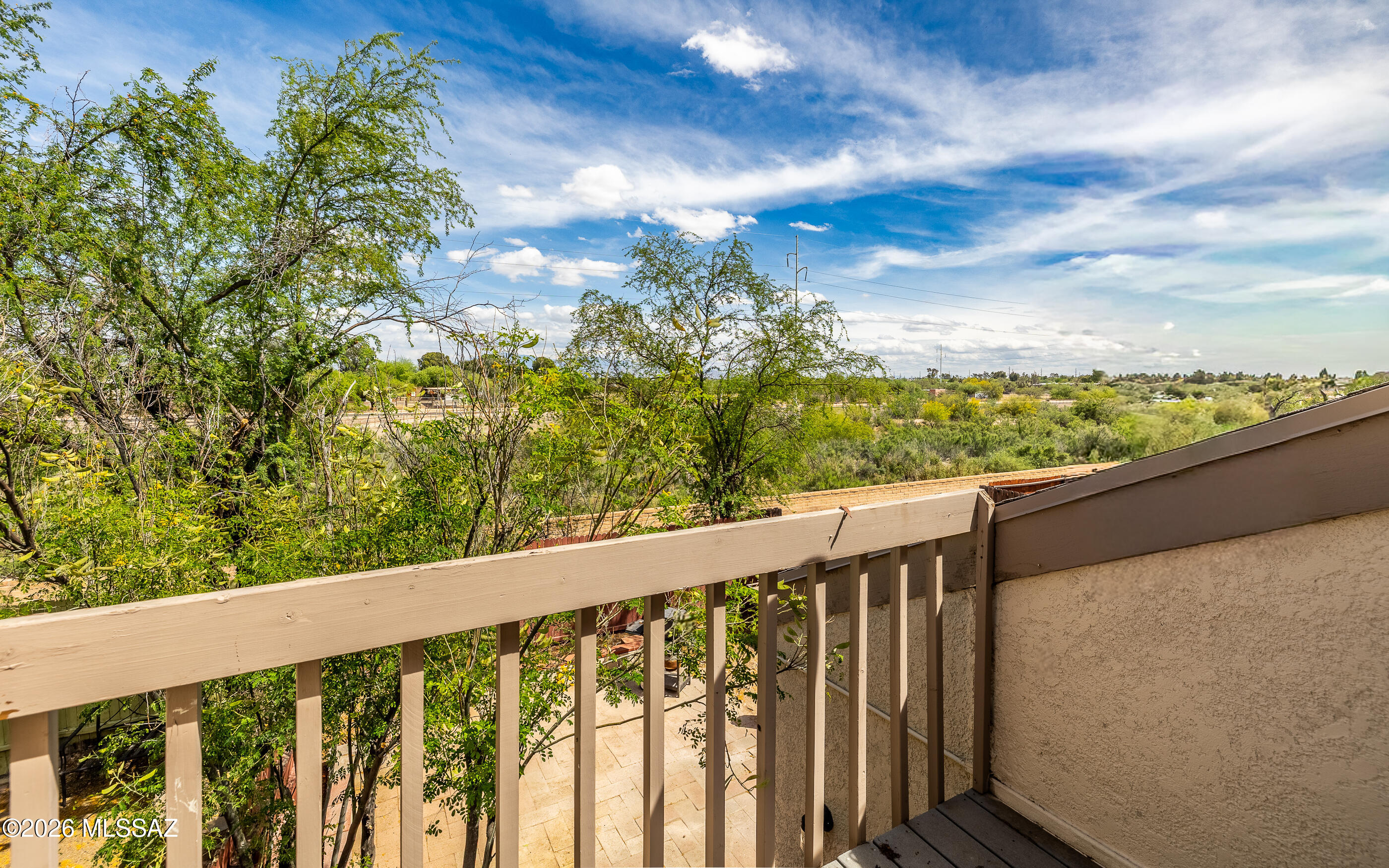 3750 North Country Club Road, Unit 46 Tucson, AZ 85716 - Photo 23 of 34 a balcony with an outdoor view