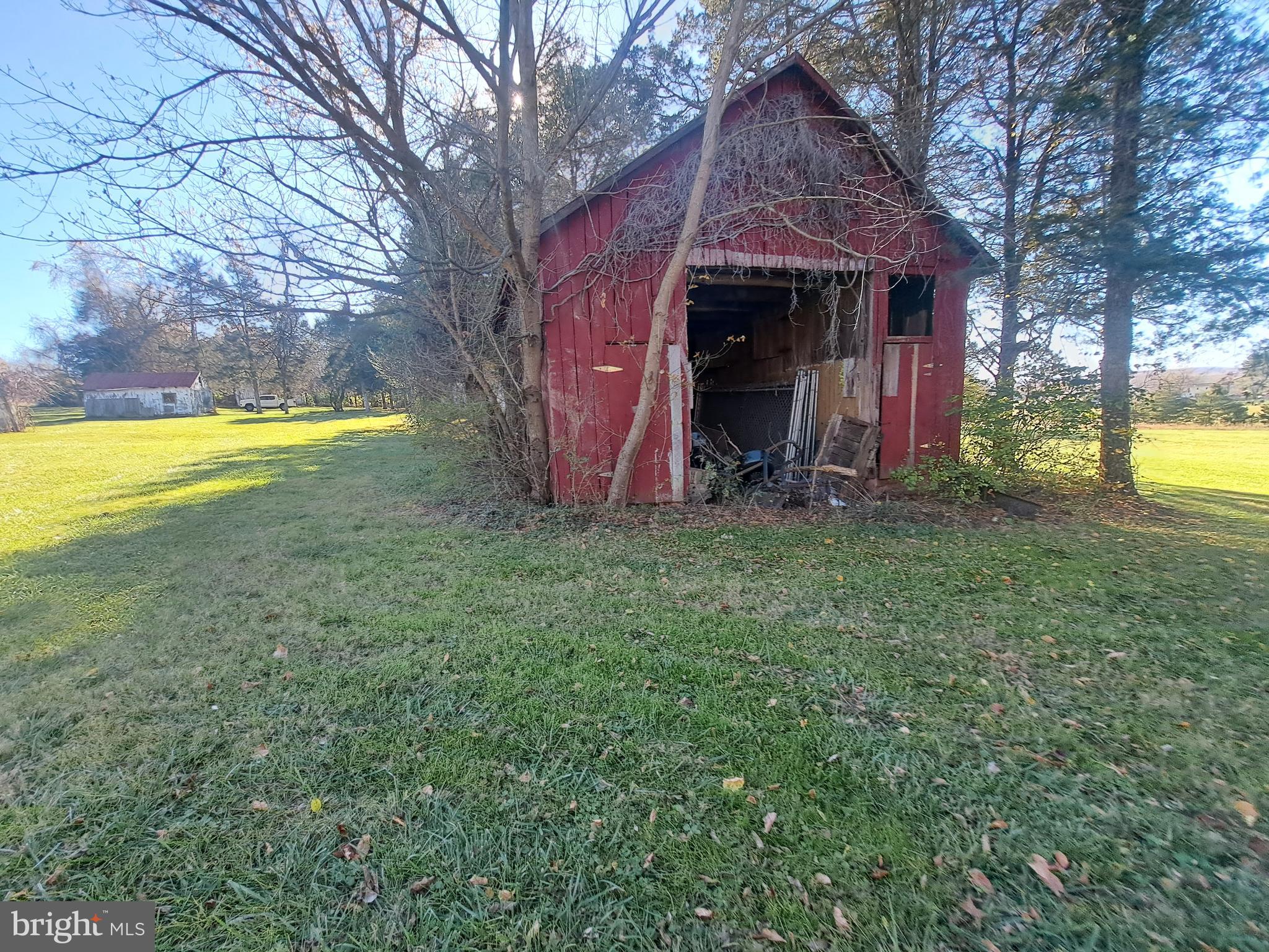 24401 River Road Dickerson, MD 20842 - Photo 19 of 43 a view of a house with a yard and swimming pool