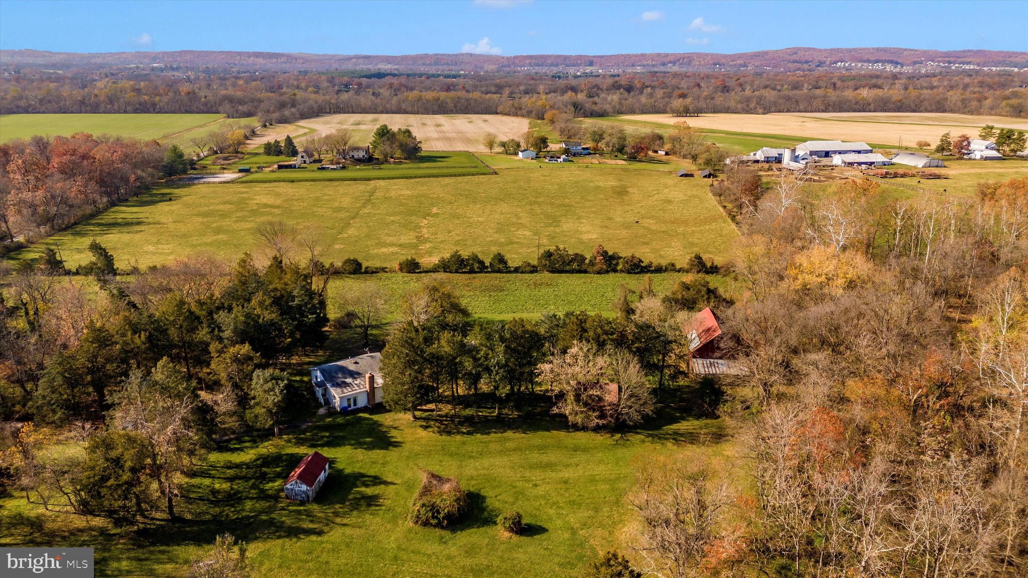24401 River Road Dickerson, MD 20842 - Photo 2 of 43 a view of a city with an ocean view