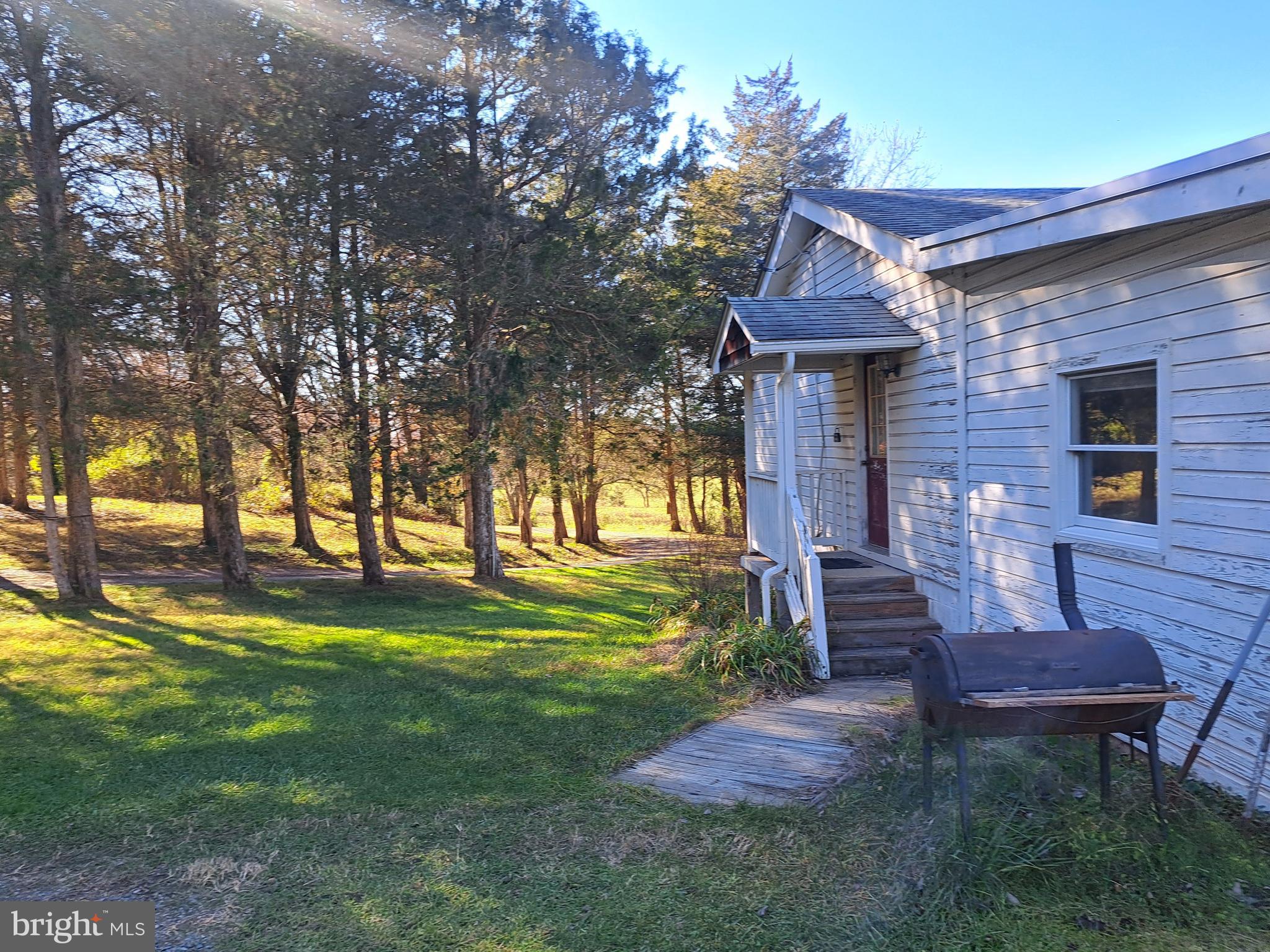 24401 River Road Dickerson, MD 20842 - Photo 22 of 43 a front view of a house with garden