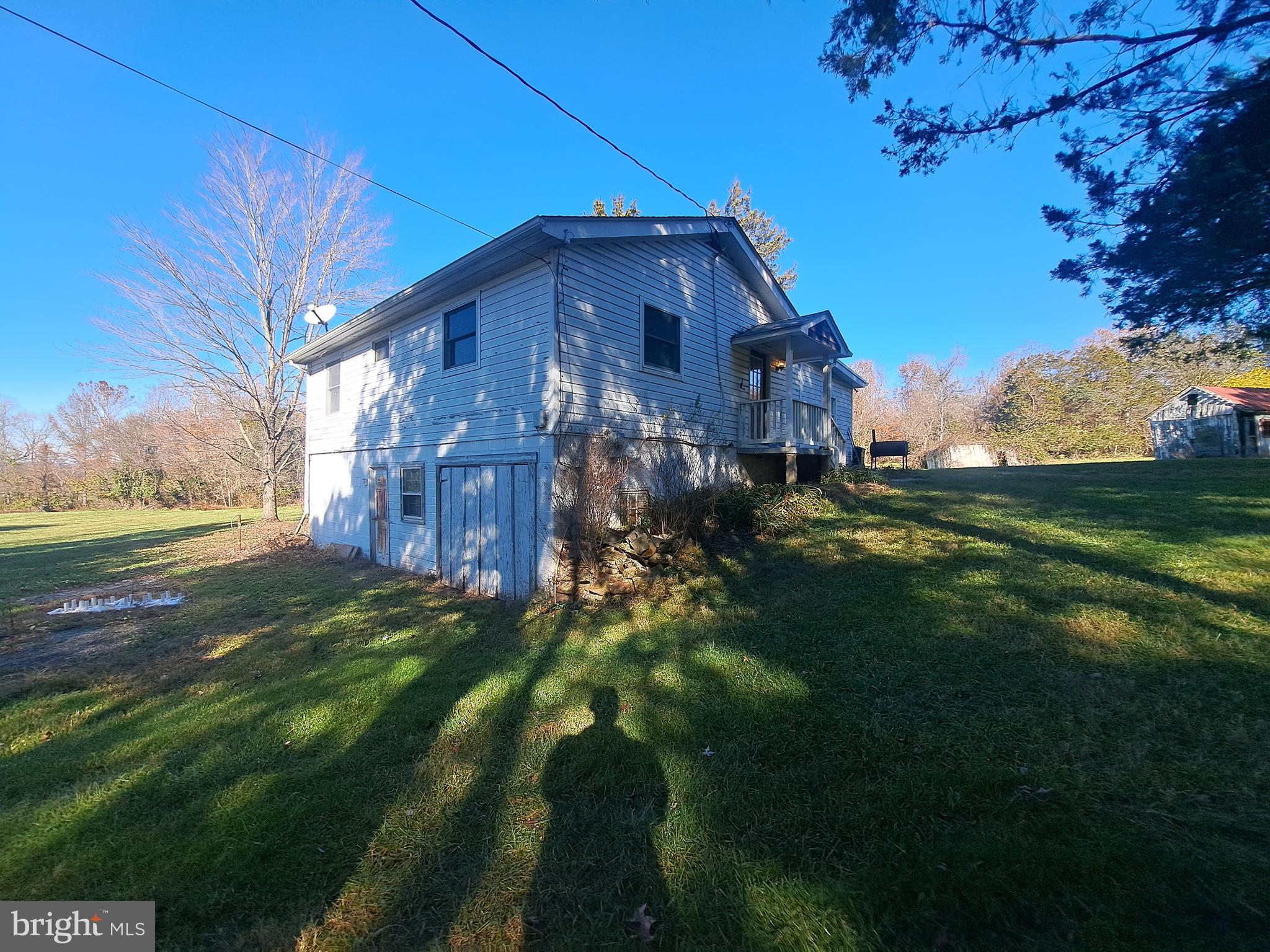 24401 River Road Dickerson, MD 20842 - Photo 26 of 43 a backyard of a house with lots of green space