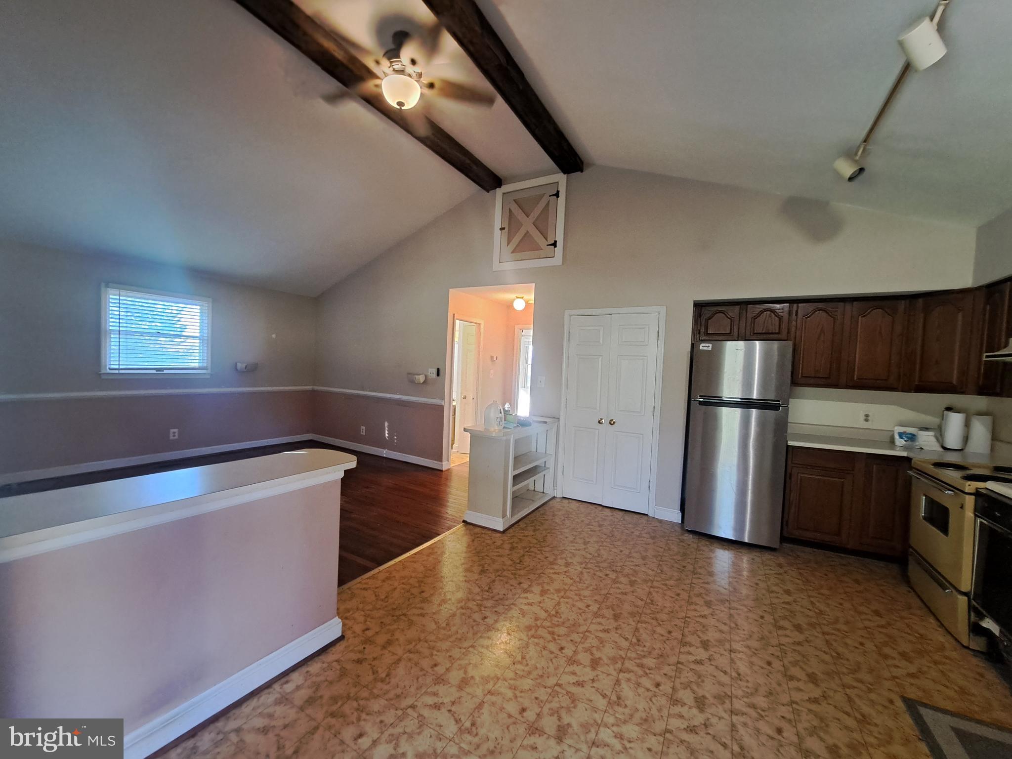 24401 River Road Dickerson, MD 20842 - Photo 28 of 43 a kitchen with a stove and a refrigerator