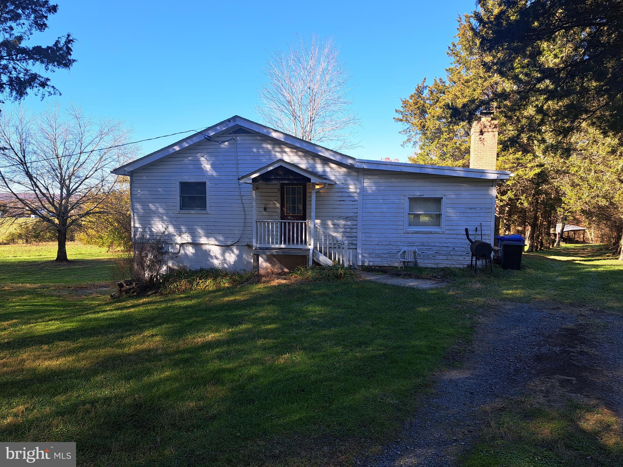 24401 River Road Dickerson, MD 20842 - Photo 43 of 43 a front view of a house with a garden