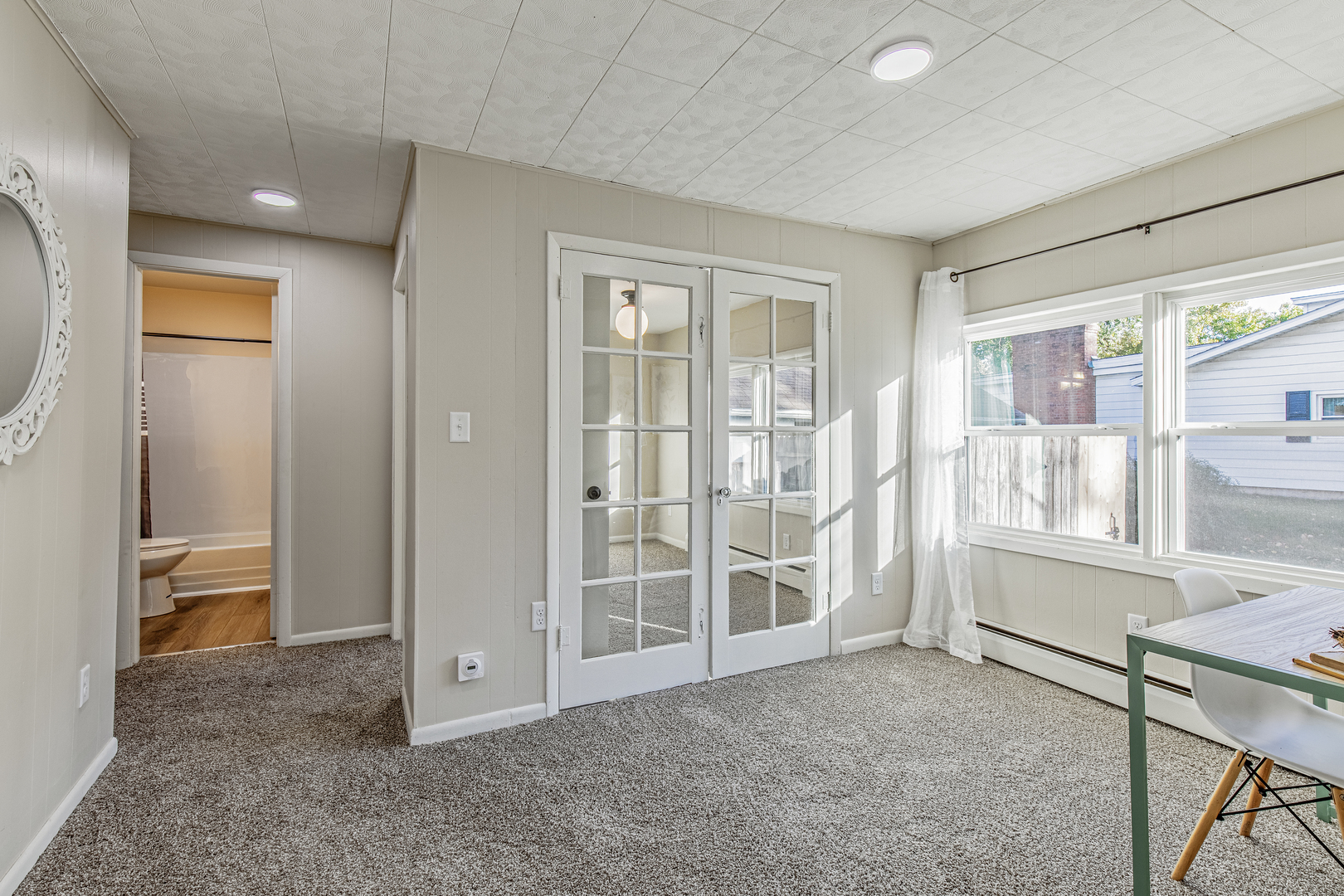 215 North Randolph Street Princeton, IL 61356 - Photo 13 of 24 a view of livingroom with furniture window and front door