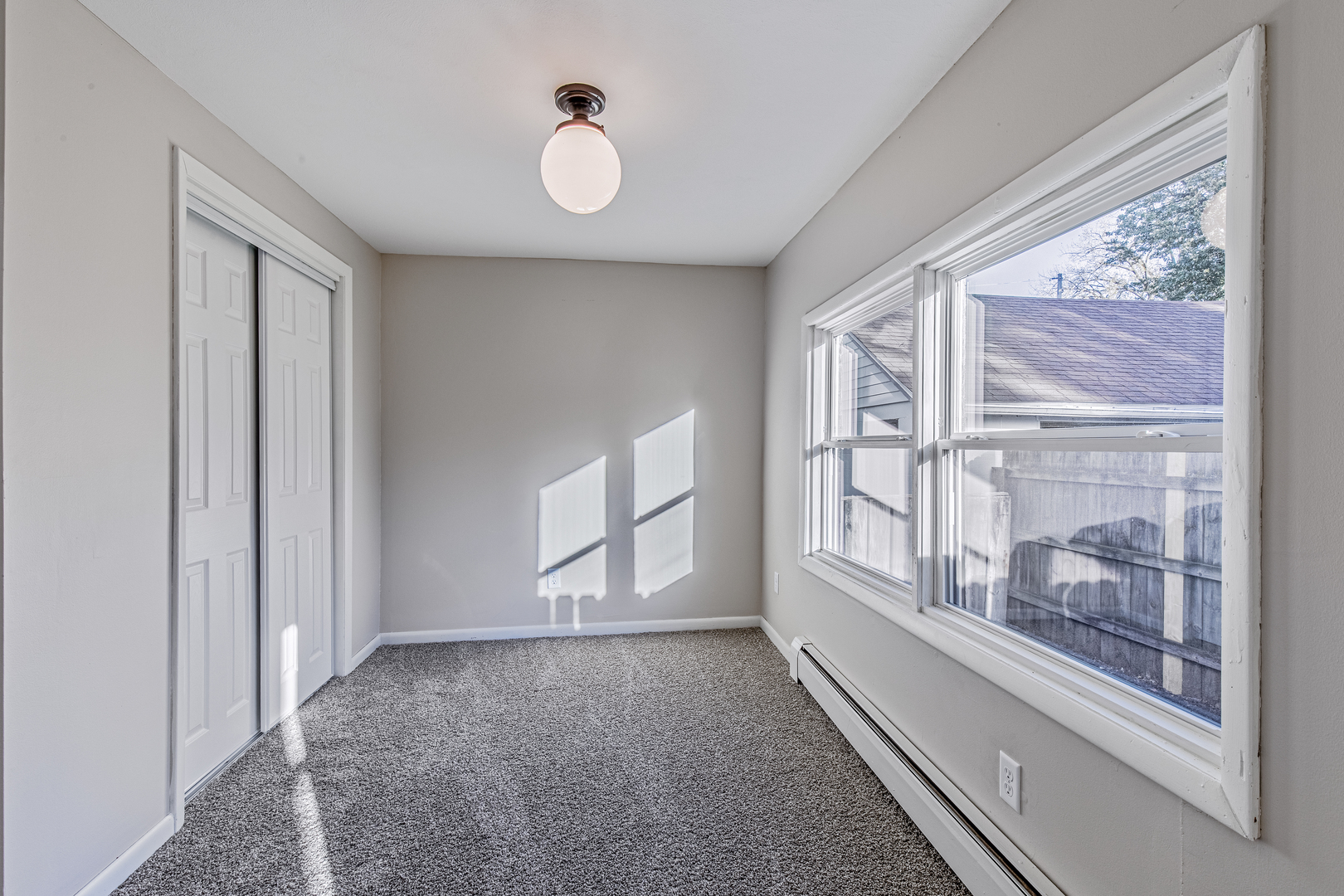 215 North Randolph Street Princeton, IL 61356 - Photo 15 of 24 a view of a livingroom with an entryway and wooden floor