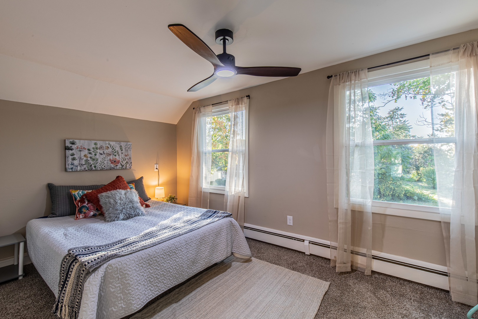 215 North Randolph Street Princeton, IL 61356 - Photo 16 of 24 a bedroom with a large bed and a window