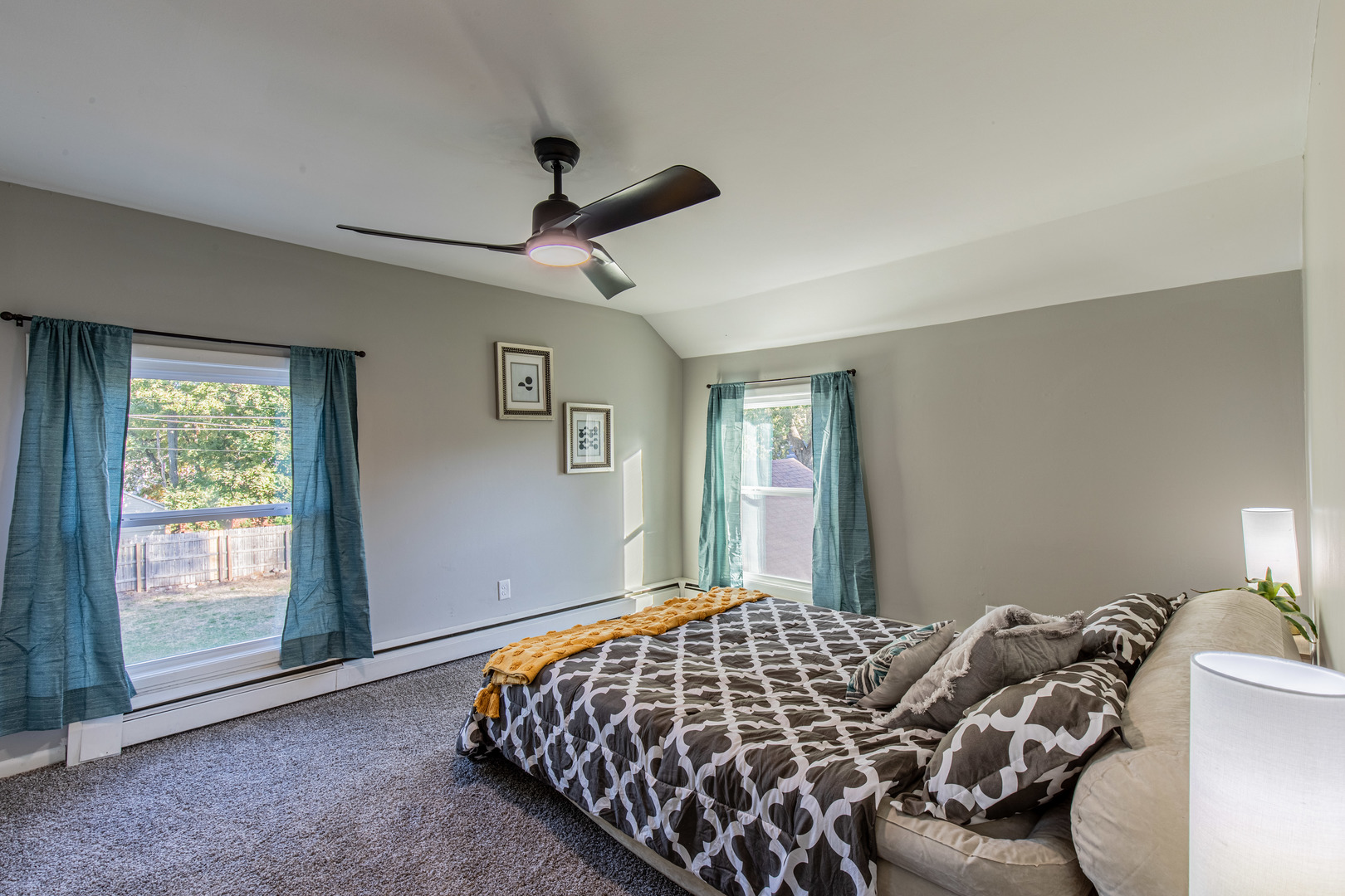 215 North Randolph Street Princeton, IL 61356 - Photo 17 of 24 a bedroom with a bed and a window