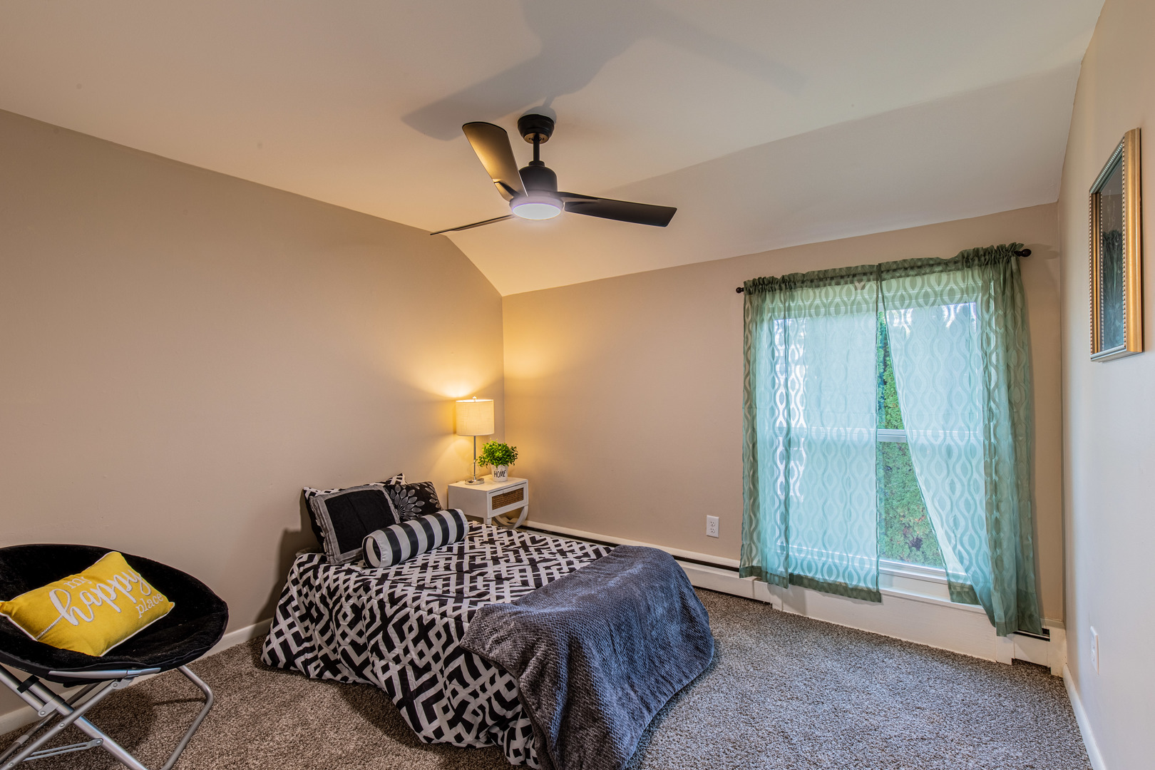 215 North Randolph Street Princeton, IL 61356 - Photo 18 of 24 a bedroom with a bed and a window