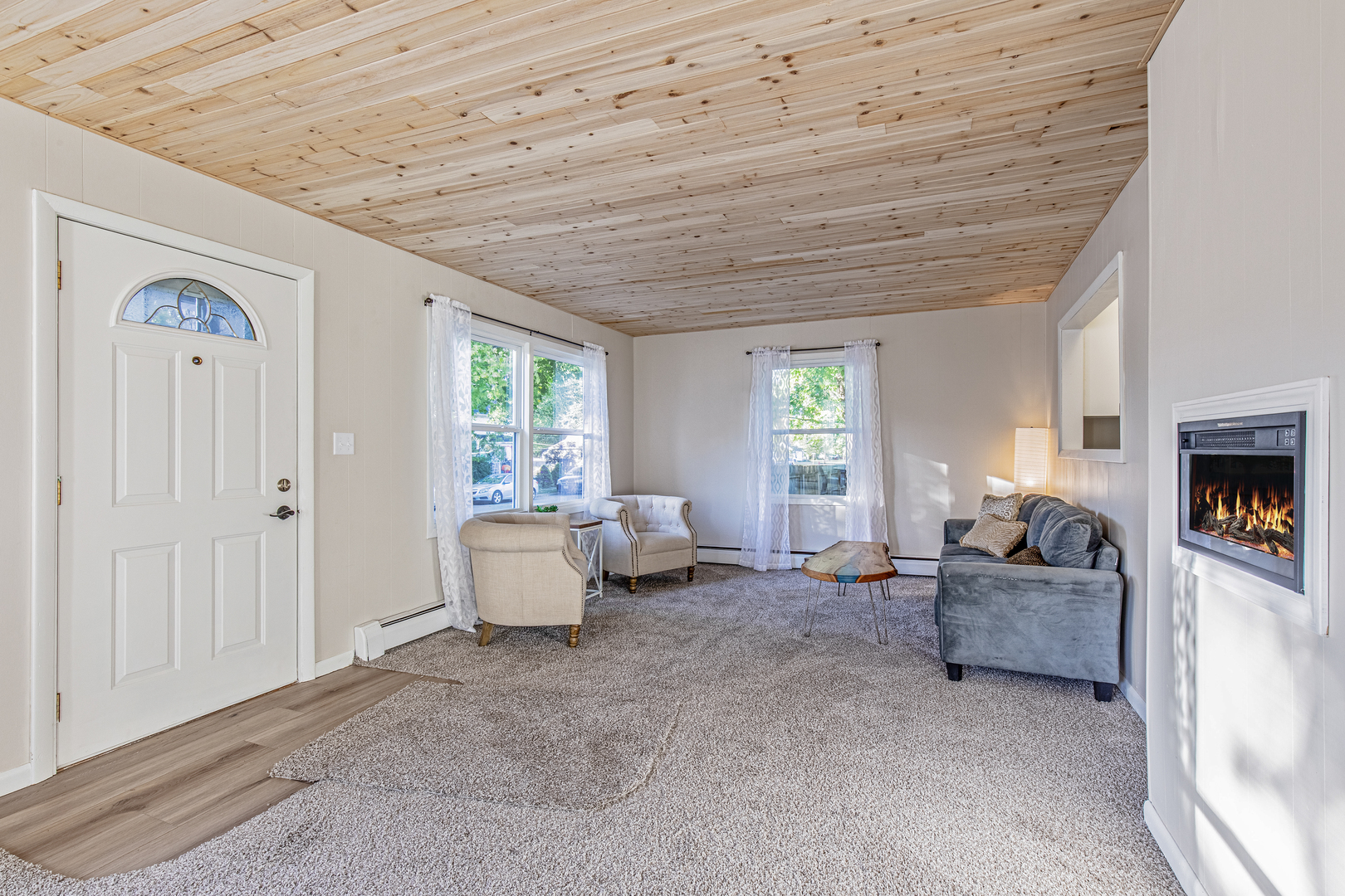 215 North Randolph Street Princeton, IL 61356 - Photo 6 of 24 a living room with furniture and a window