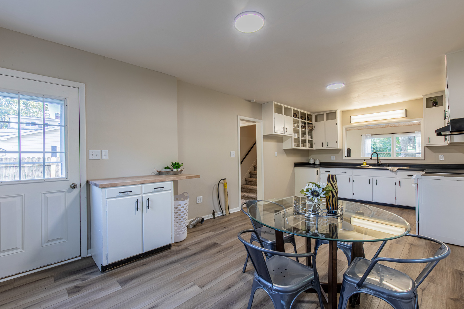 215 North Randolph Street Princeton, IL 61356 - Photo 10 of 24 a view of a dining room with furniture and wooden floor
