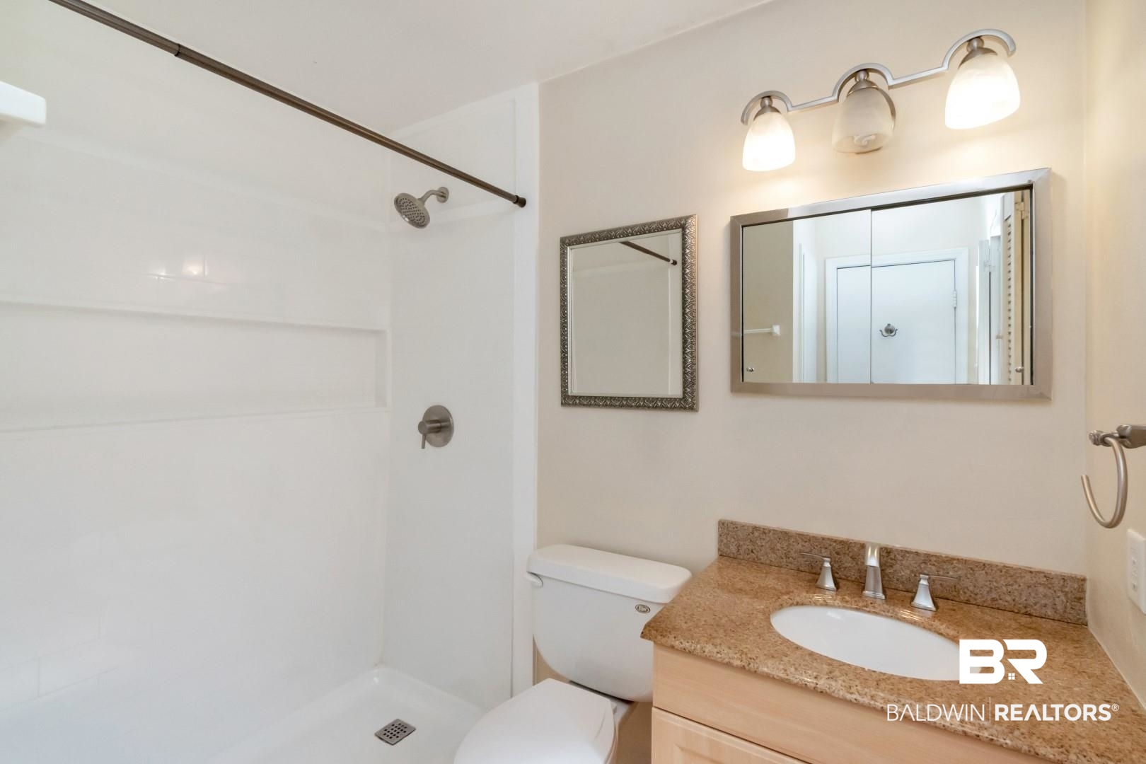 320 Vanderbilt Drive Mobile, AL 36608 - Photo 29 of 39 Bathroom with walk in shower, vanity, and toilet