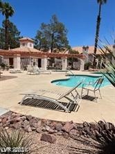 7570 West Flamingo Road, Unit 125 Las Vegas, NV 89147 - Photo 22 of 29 Community pool with a patio