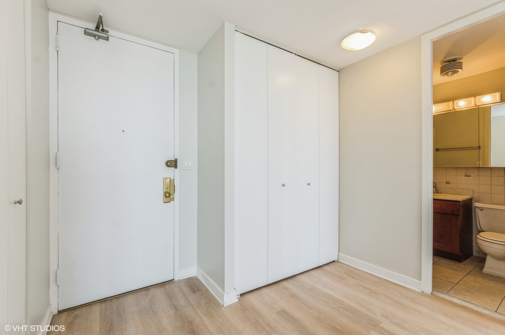 655 West Irving Park Road, Unit 3006 Chicago, IL 60613 - Photo 13 of 23 a view of an empty room with closet and a window