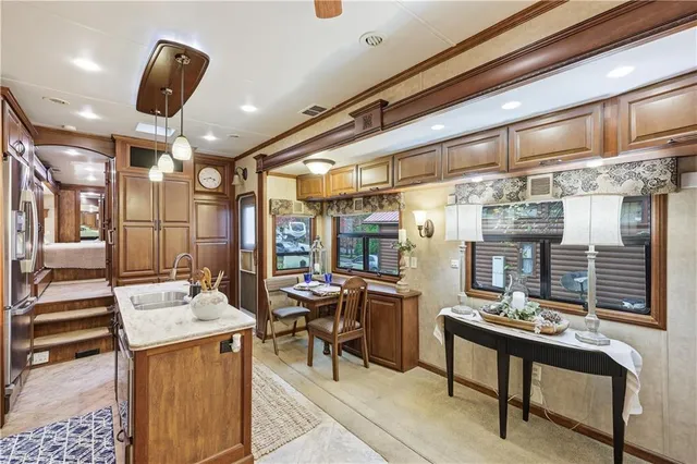 a room with lots of tables and chairs