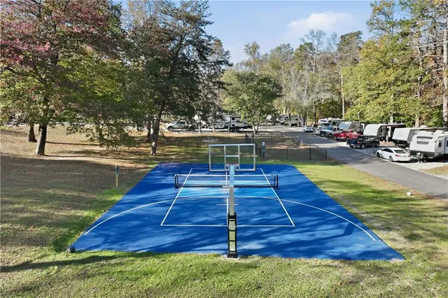 a view of a yard with swimming pool