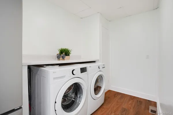 a utility room with dryer and washer