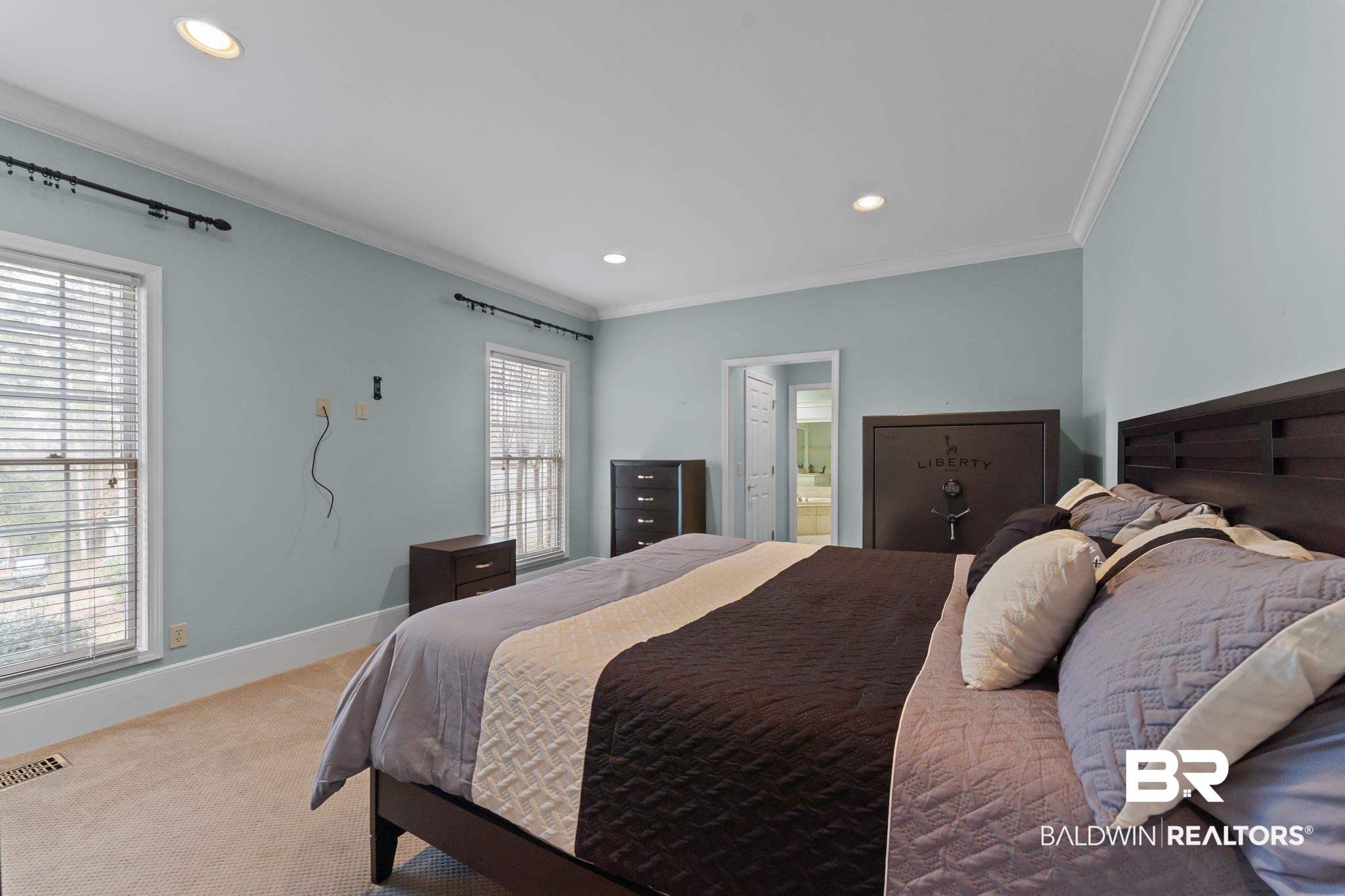 525 Norwood Road Monroeville, AL 36460 - Photo 23 of 55 Carpeted bedroom with recessed lighting, crown molding, and ensuite bath