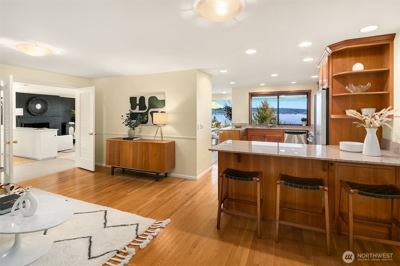 6555 Northeast Windermere Road Seattle, WA 98105 - Photo 16 of 40 a kitchen with a sink and chairs