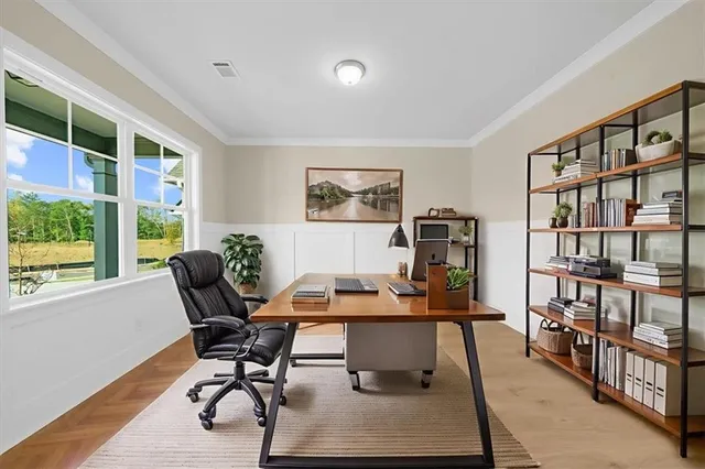 a workspace with furniture and a bookshelf