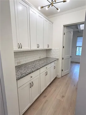 an empty room with cabinets