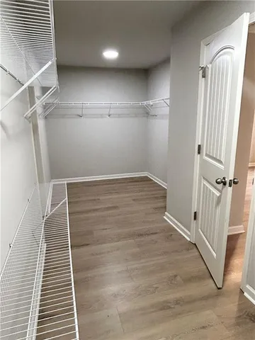 wooden floor in a hall with an entryway