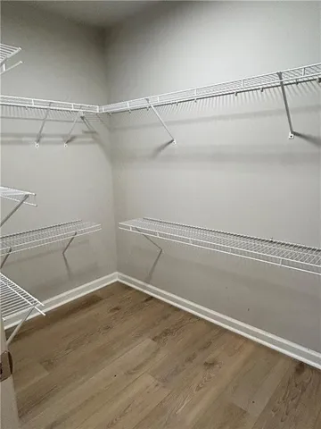 a view of a room with racks on the wall