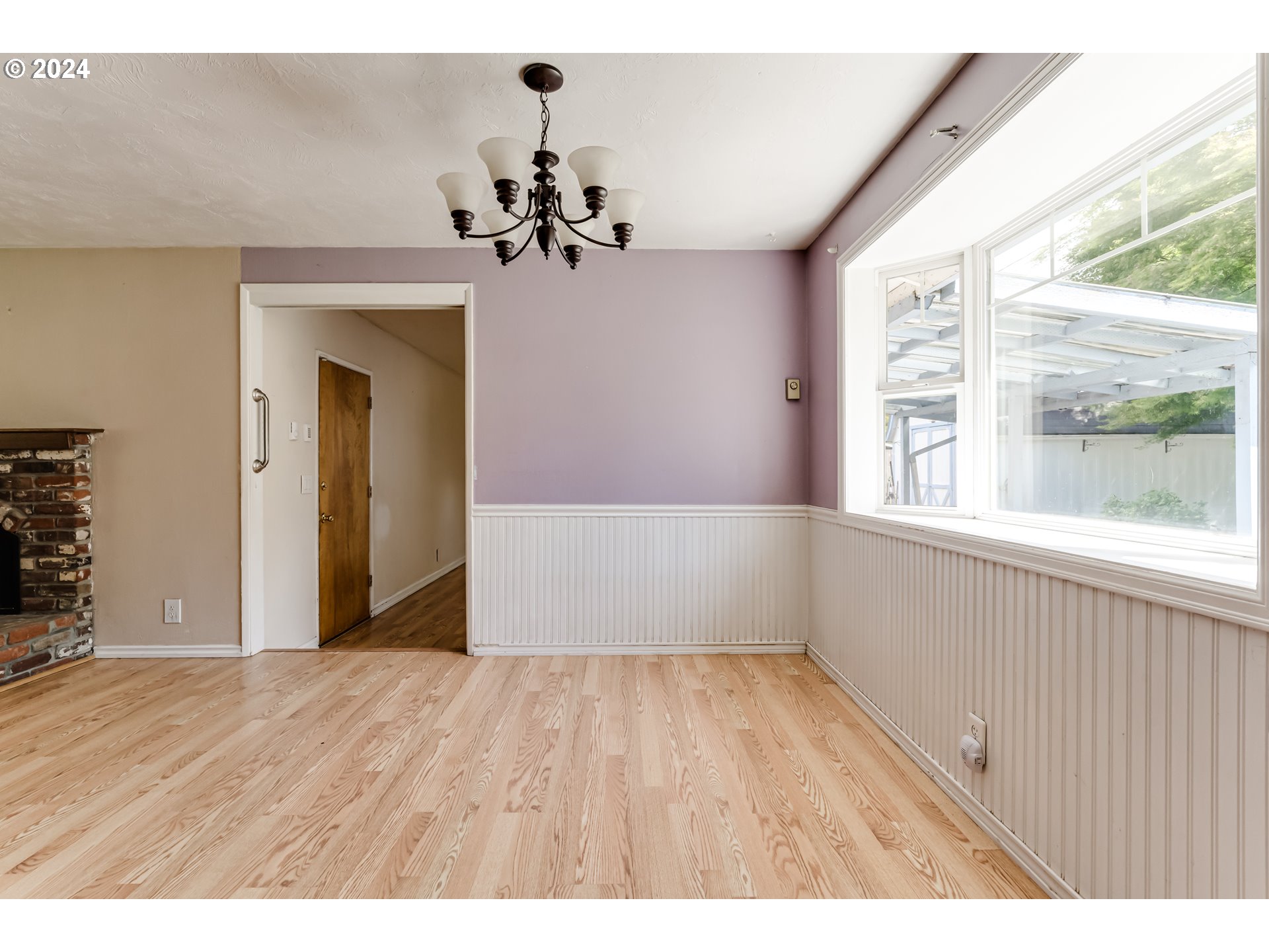 4115 Scottdale Street Eugene, OR 97404 - Photo 16 of 33 a view of a room with a window and wooden floor