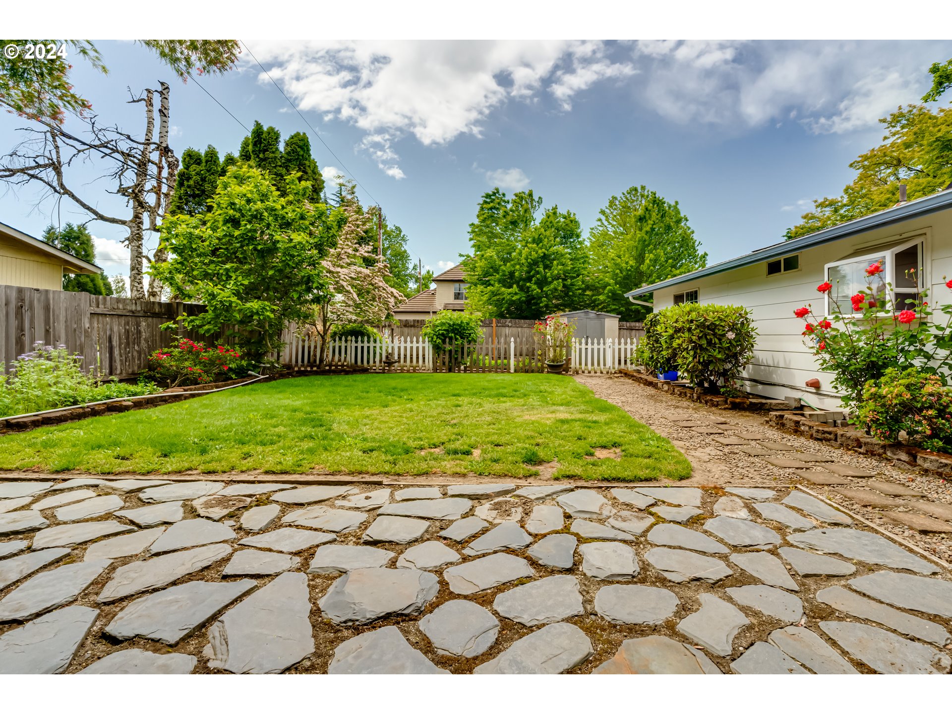 4115 Scottdale Street Eugene, OR 97404 - Photo 30 of 33 a view of a yard with plants
