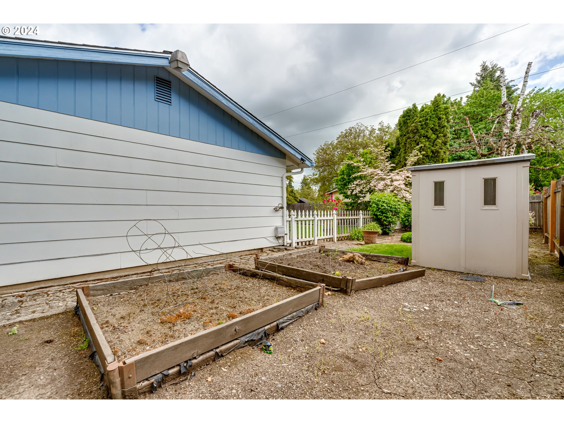 4115 Scottdale Street Eugene, OR 97404 - Photo 32 of 33 a view of a backyard with chairs