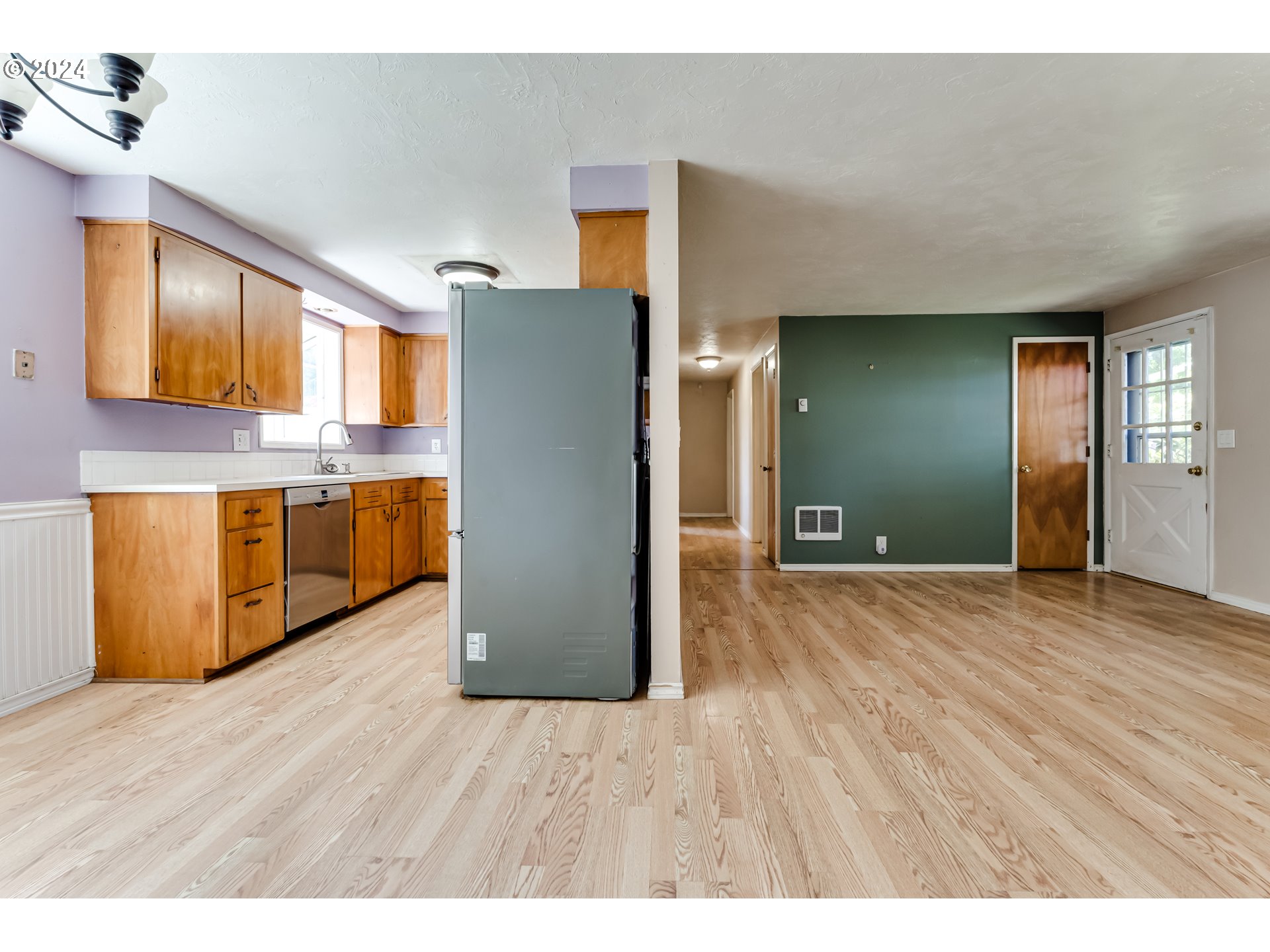 4115 Scottdale Street Eugene, OR 97404 - Photo 10 of 33 a kitchen with stainless steel appliances granite countertop a refrigerator and a stove top oven