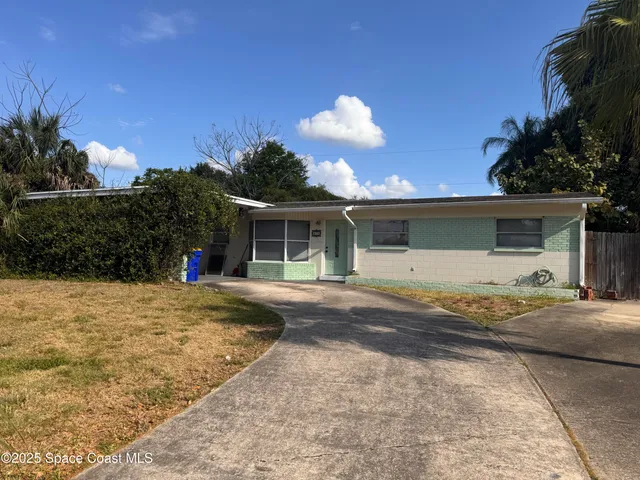 a view of a house with a patio