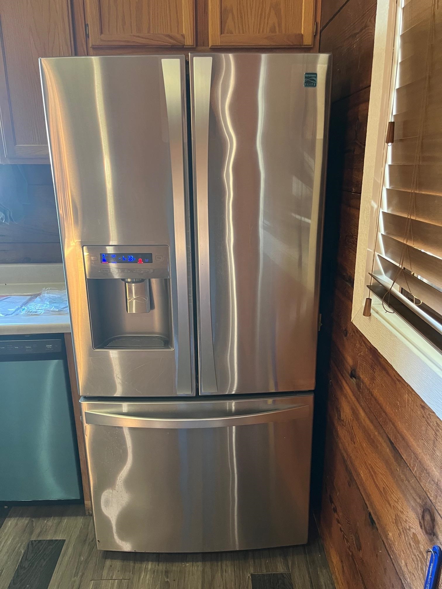 4161 Lucy Road Millington, TN 38053 - Photo 12 of 24 Kitchen view of stainless steel appliances and dark wood-style flooring