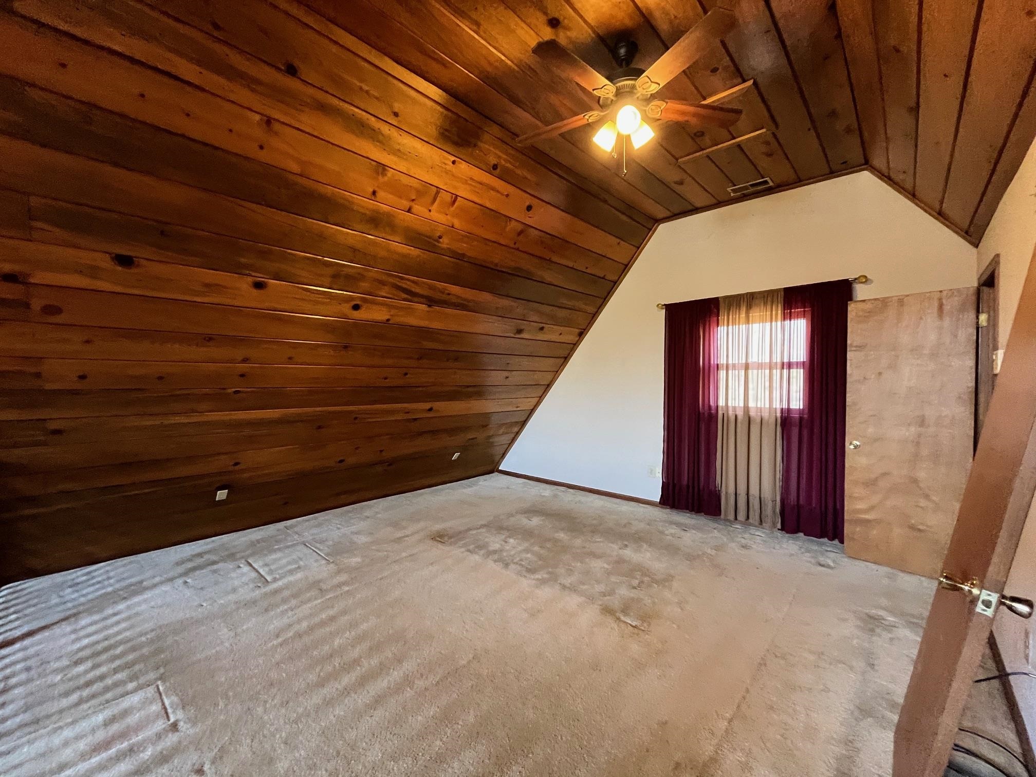 4161 Lucy Road Millington, TN 38053 - Photo 20 of 24 Additional living space featuring a vaulted wooden ceiling, ceiling fan, and carpet flooring