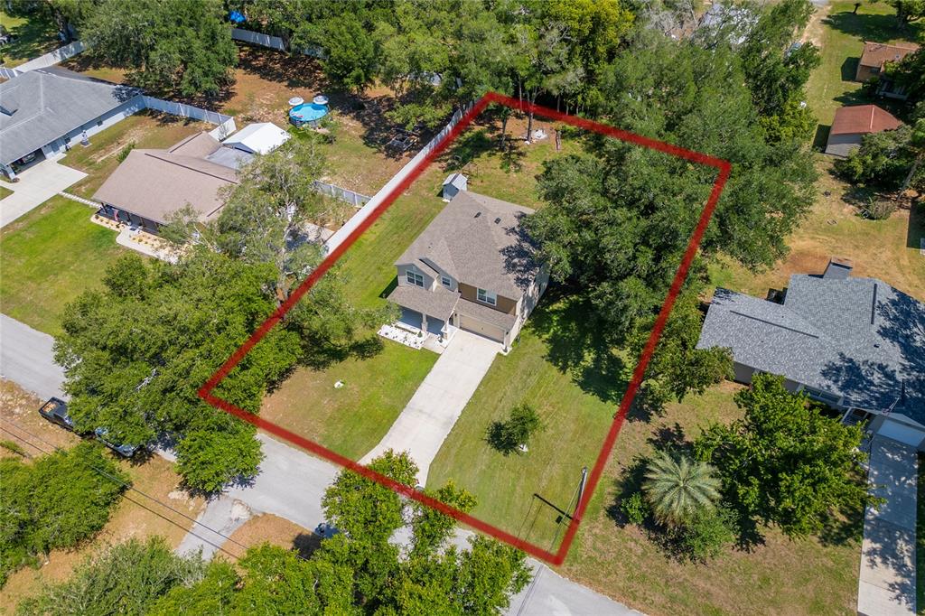 4331 Wayne Road Fruitland Park, FL 34731 - Photo 7 of 46 an aerial view of a house