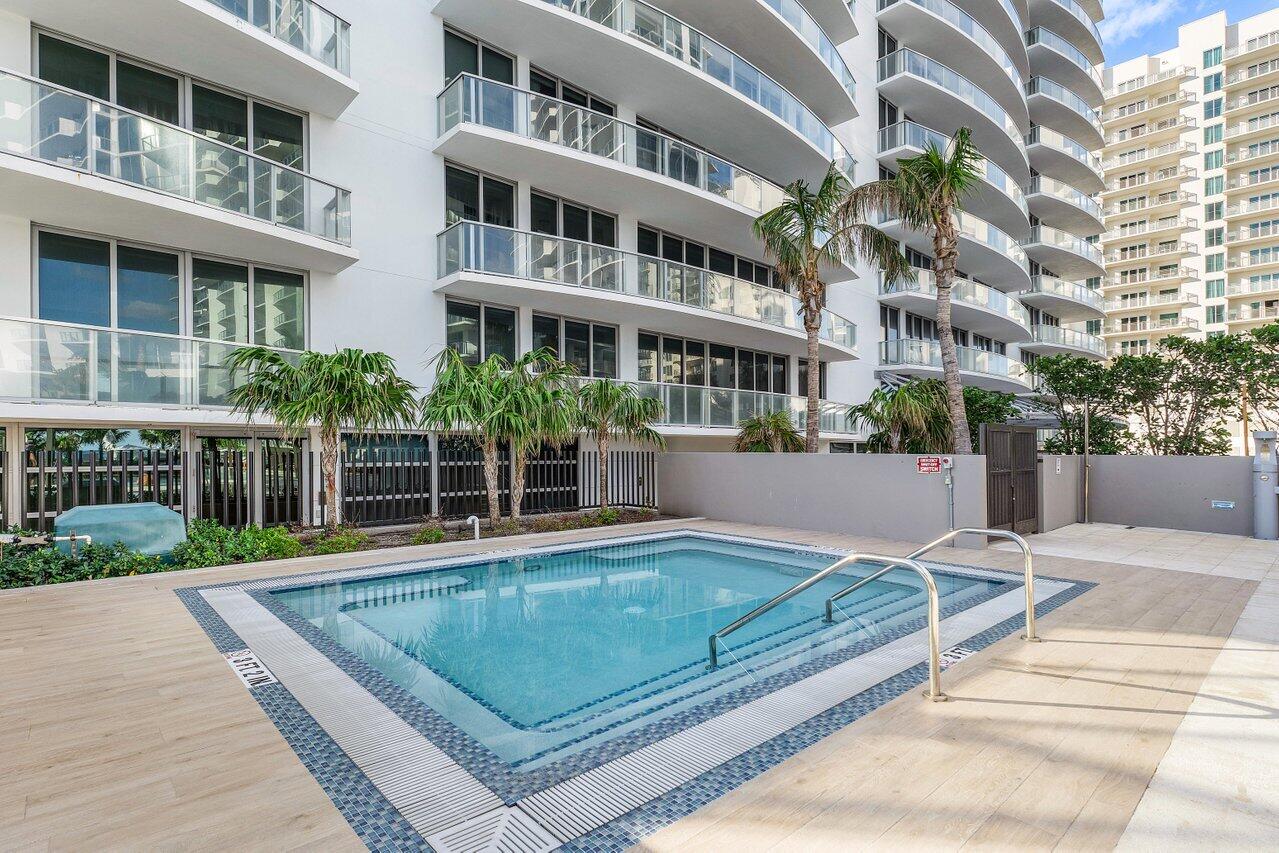 3100 North Ocean Drive, Unit P705 Riviera Beach, FL 33404 - Photo 37 of 98 a view of a building with a garden