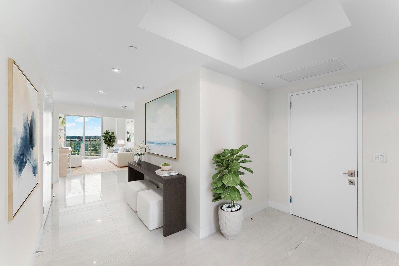 3100 North Ocean Drive, Unit P705 Riviera Beach, FL 33404 - Photo 7 of 98 a living room with furniture and a potted plant