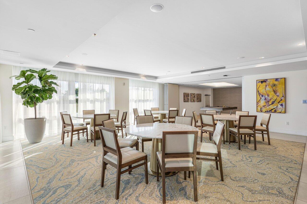 3100 North Ocean Drive, Unit P705 Riviera Beach, FL 33404 - Photo 79 of 98 a view of a dining room with furniture and a potted plant
