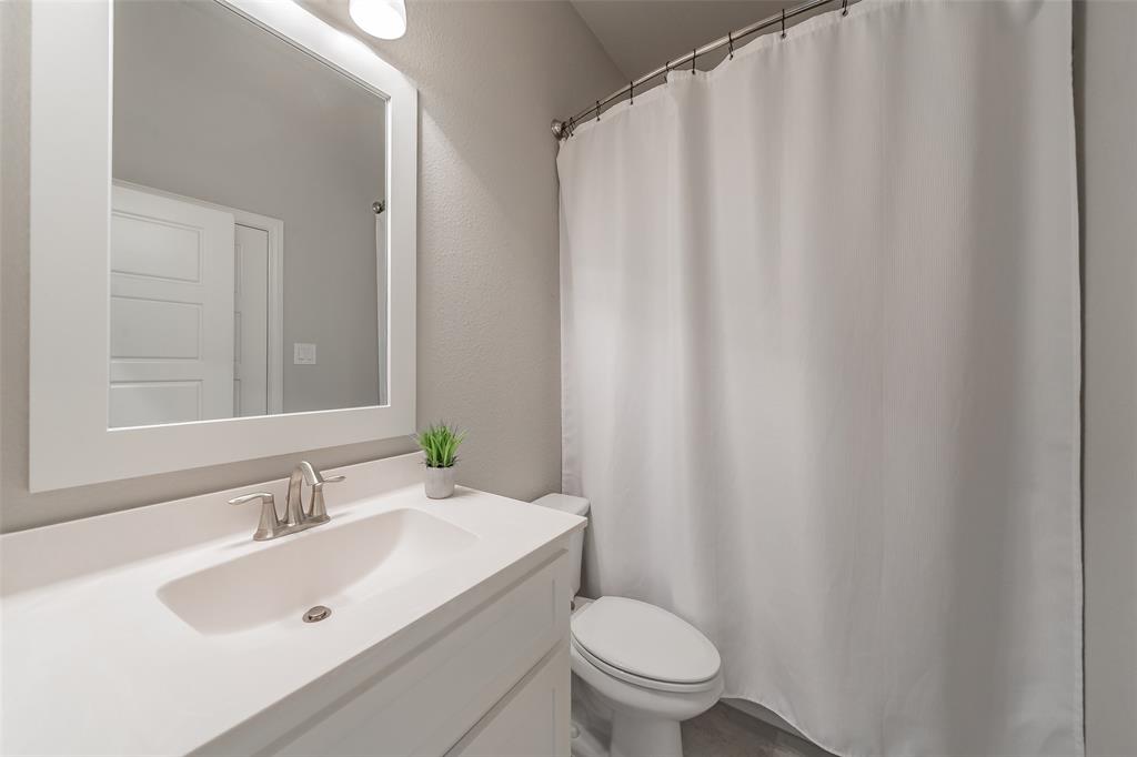 11609 Little Elm Creek Road Flower Mound, TX 76226 - Photo 26 of 40 a bathroom with a sink and a toilet