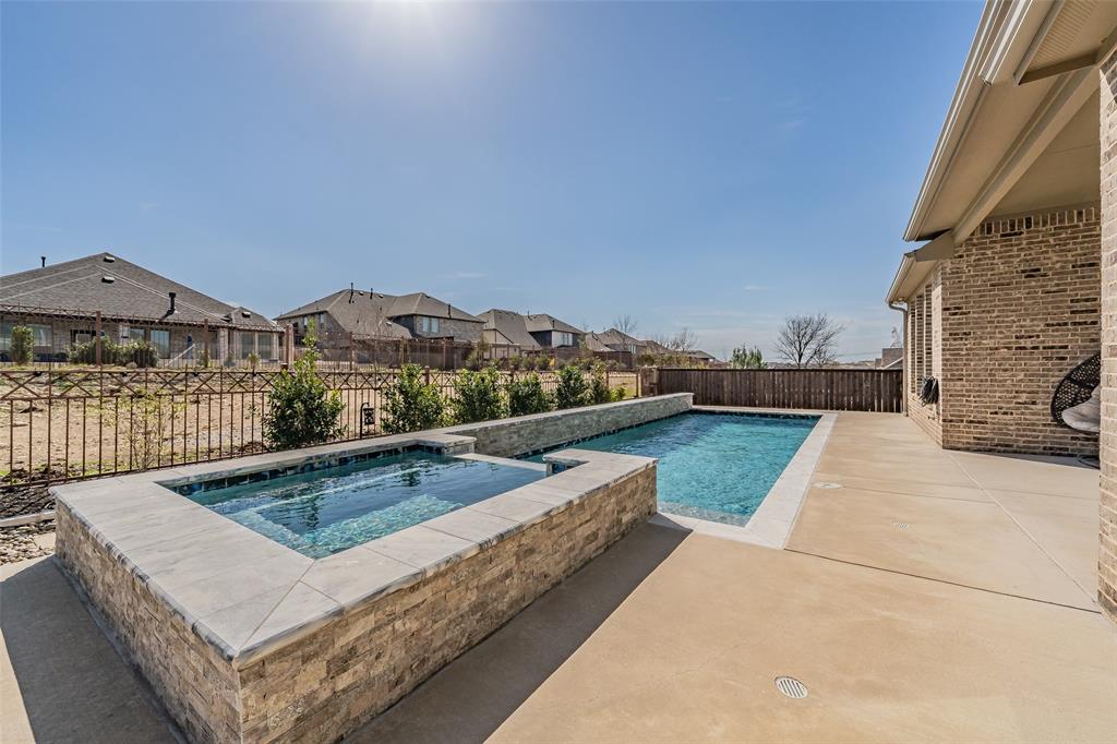 11609 Little Elm Creek Road Flower Mound, TX 76226 - Photo 33 of 40 a view of swimming pool with a terrace seating