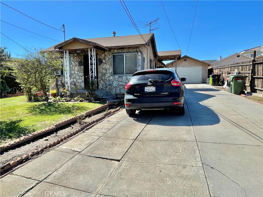 a car parked in front of a house