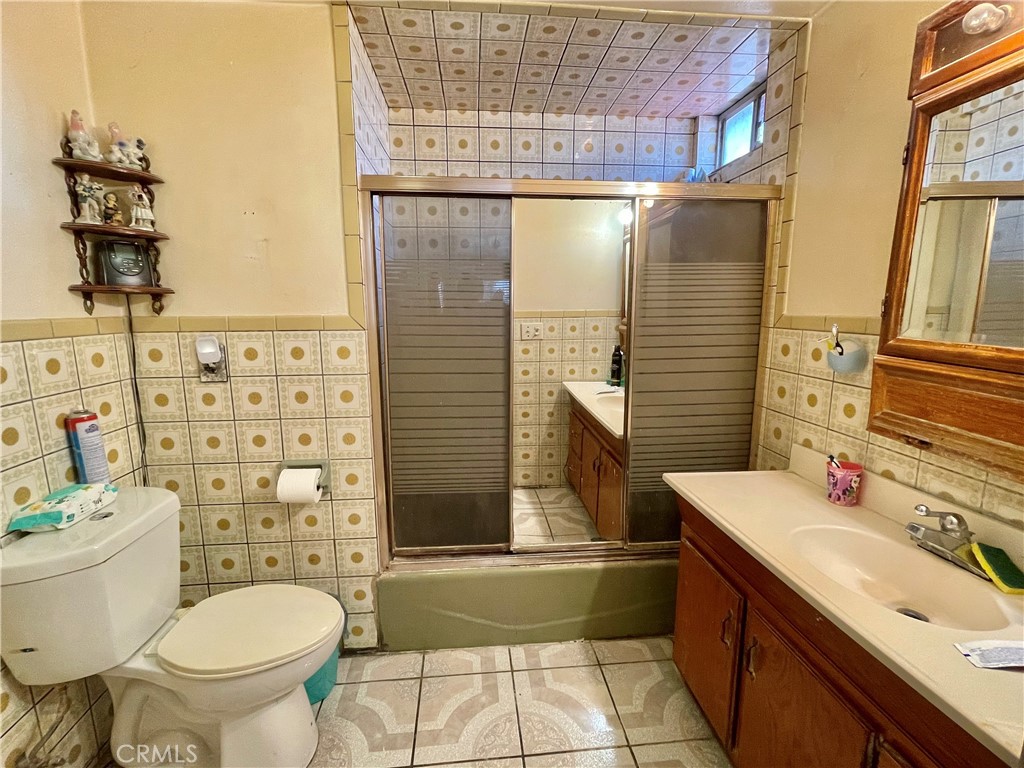 2525 Falling Leaf Avenue Rosemead, CA 91770 - Photo 13 of 28 a bathroom with a sink toilet and shower