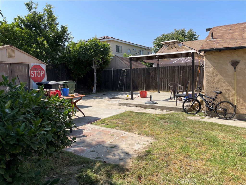 2525 Falling Leaf Avenue Rosemead, CA 91770 - Photo 24 of 28 a view of the patio with a table and chairs under an umbrella