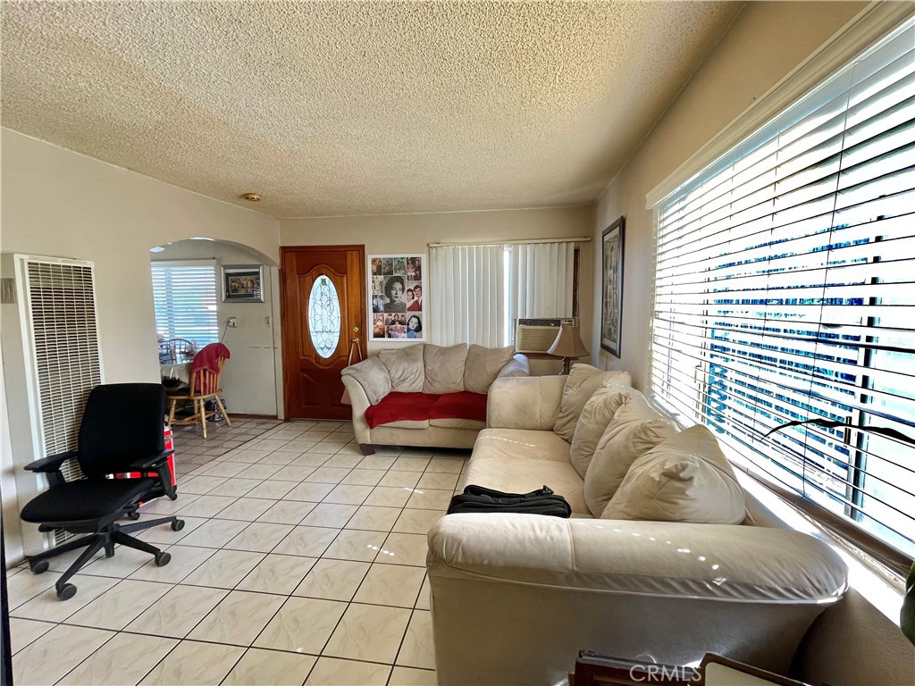 2525 Falling Leaf Avenue Rosemead, CA 91770 - Photo 10 of 28 a living room with furniture and a window