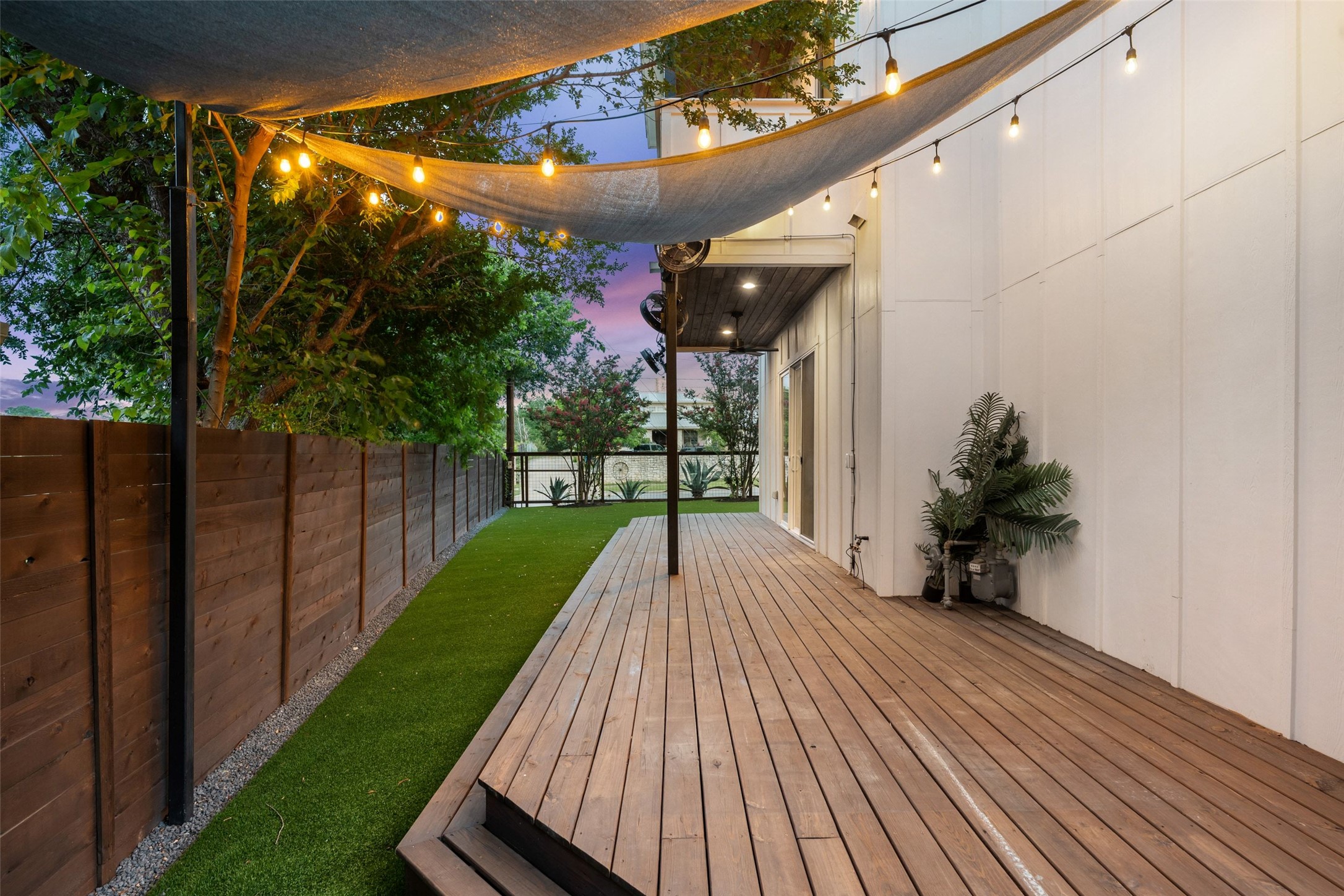 5601 Jackie Robinson Street, Unit 1 Austin, TX 78721 - Photo 37 of 40 Step outside into a fully curated outdoor retreat designed for year-round Texas living