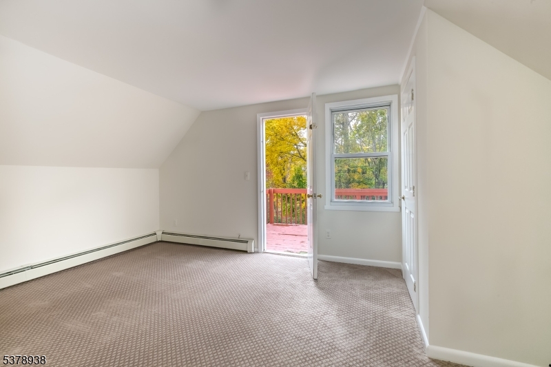 71 Madison Street, Unit 2 Morristown, NJ 07960 - Photo 5 of 6 an empty room with windows