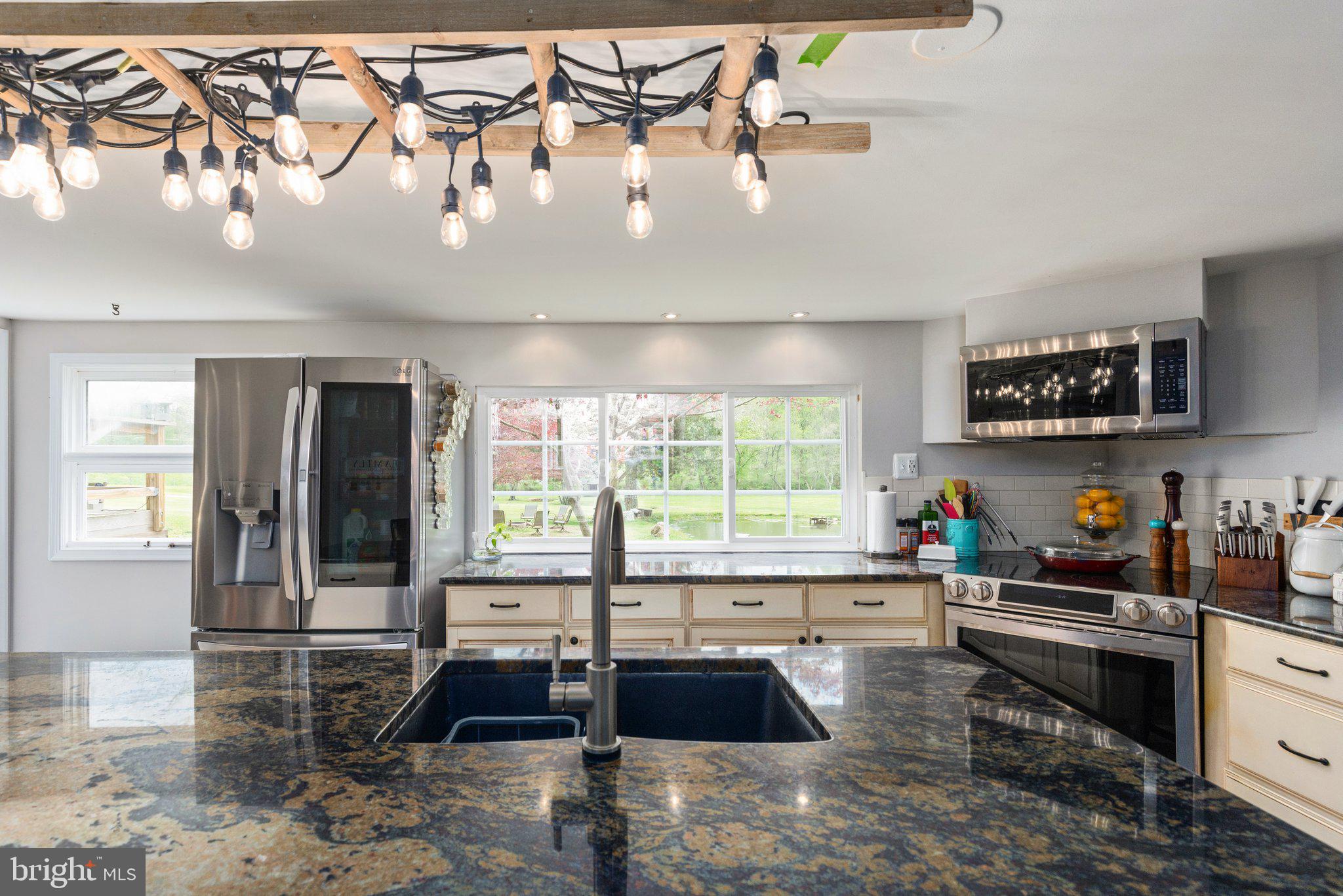 2310 Putnam Road Forest Hill, MD 21050 - Photo 52 of 90 Modern kitchen with stylish lighting.