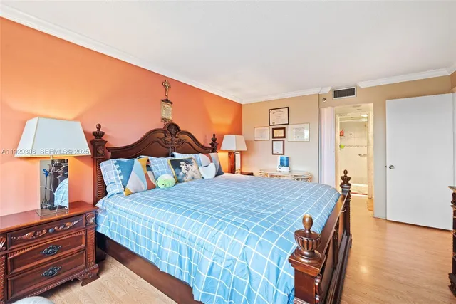 a bathroom with a granite countertop shower sink and mirror